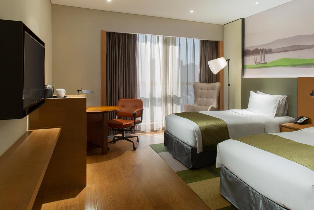 Holiday Inn & Suites Tianjin Downtown By Ihg,Tianjin Drum Tower,Joycity Shopping Mall,Tianjin Ancient Cultural Street,Haihe River,The Porcelain House,Convenient Access To Tianjin Binhai International Airport Экстерьер фото
